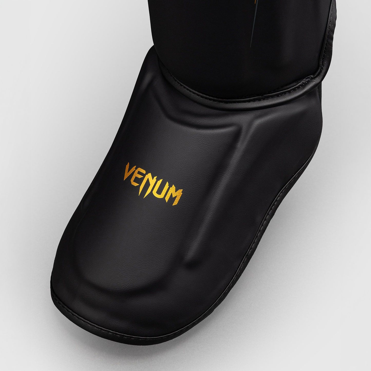 Venum Streamline Shin Guards Black/Gold - The Fight Club