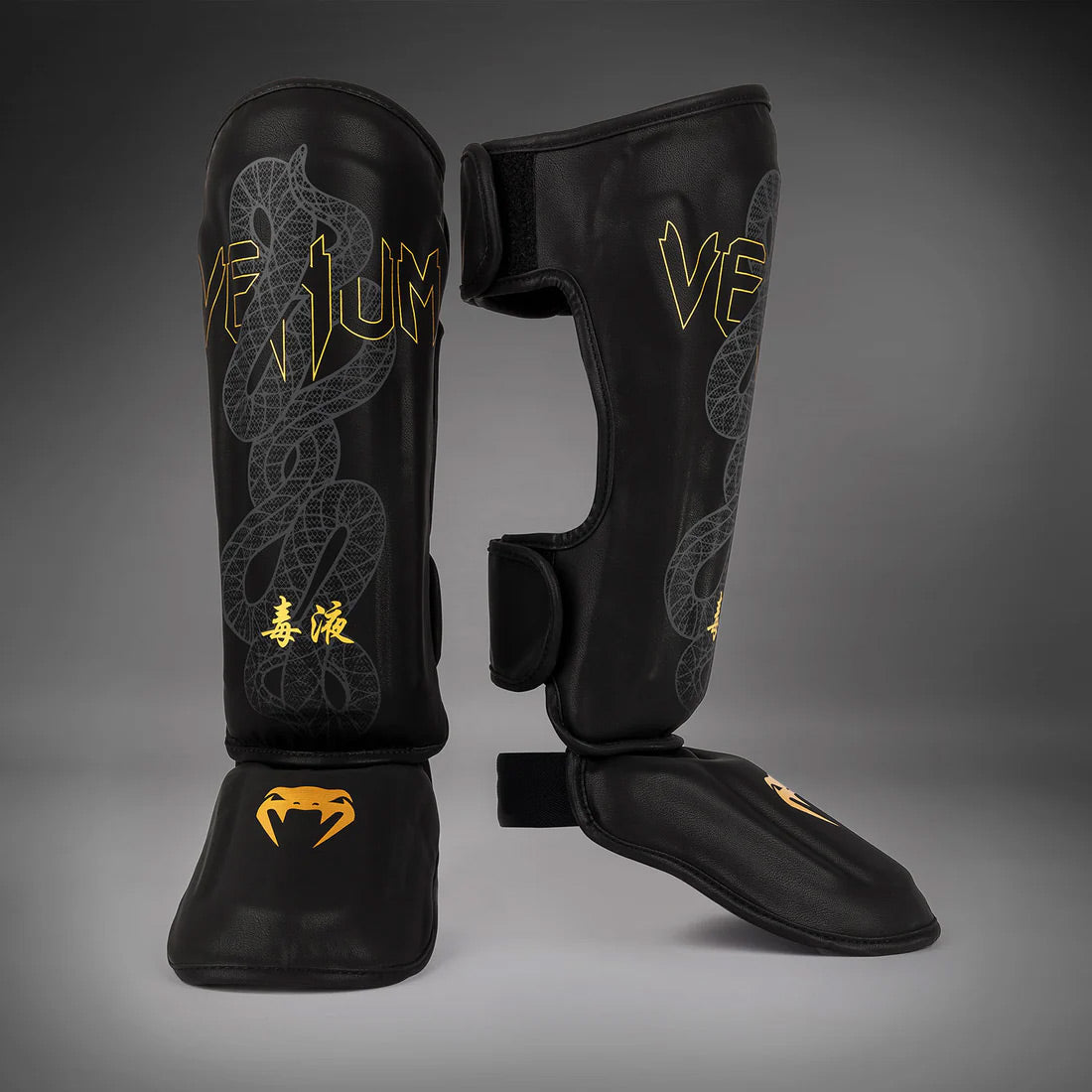 Venum Serpenti Shin Guards Black/Silver/Gold - The Fight Club