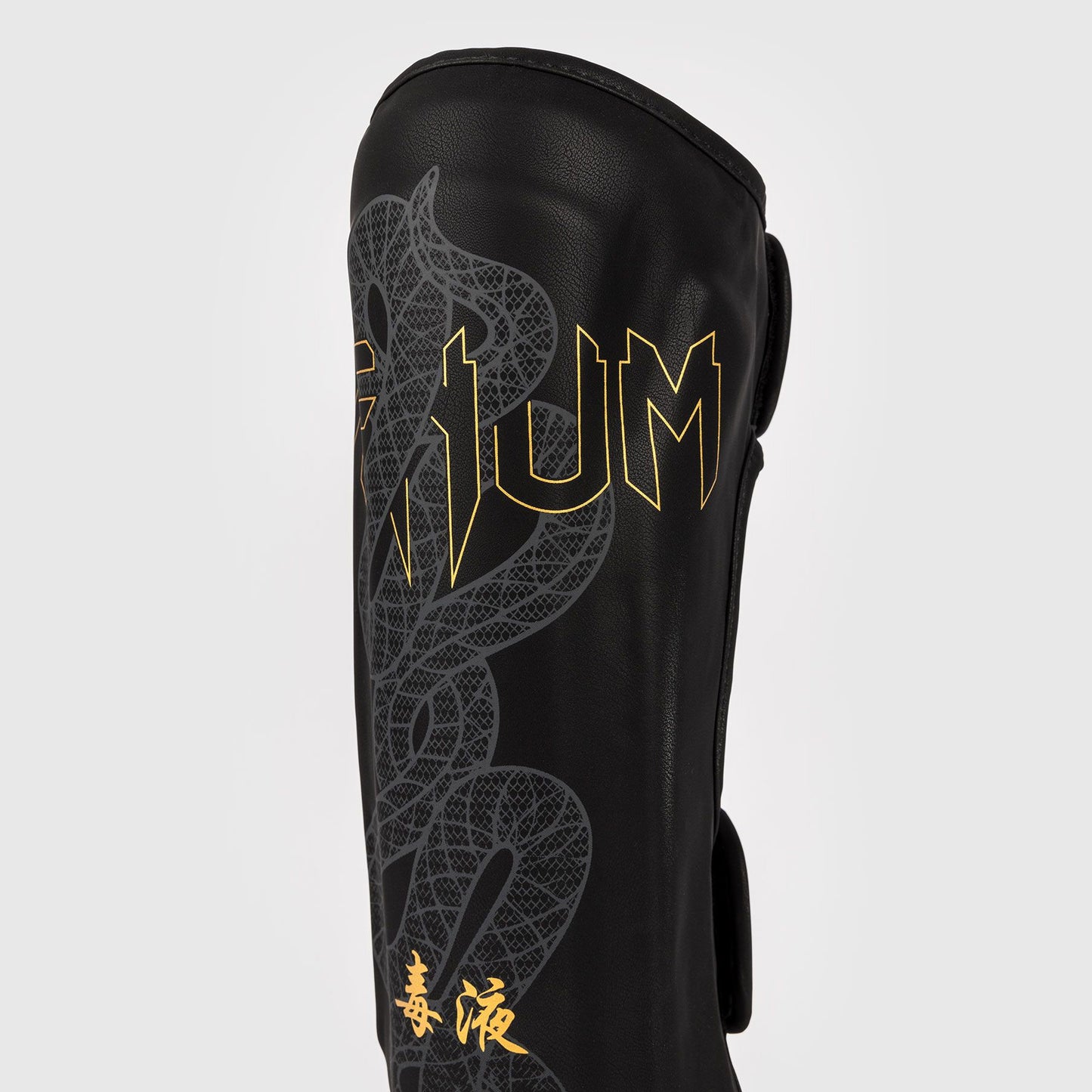 Venum Serpenti Shin Guards Black/Silver/Gold - The Fight Club
