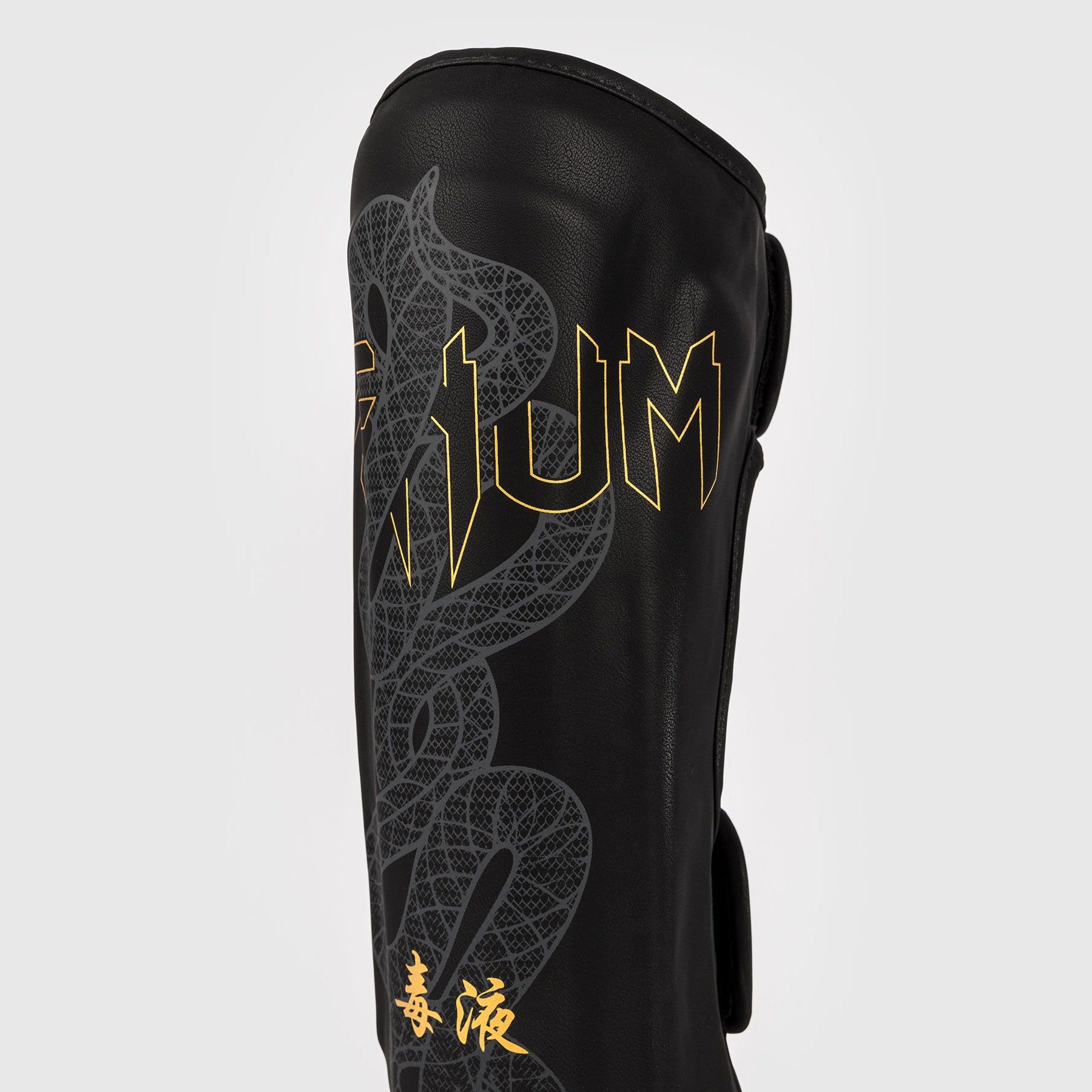 Venum Serpenti Shin Guards Black/Silver/Gold - The Fight Club