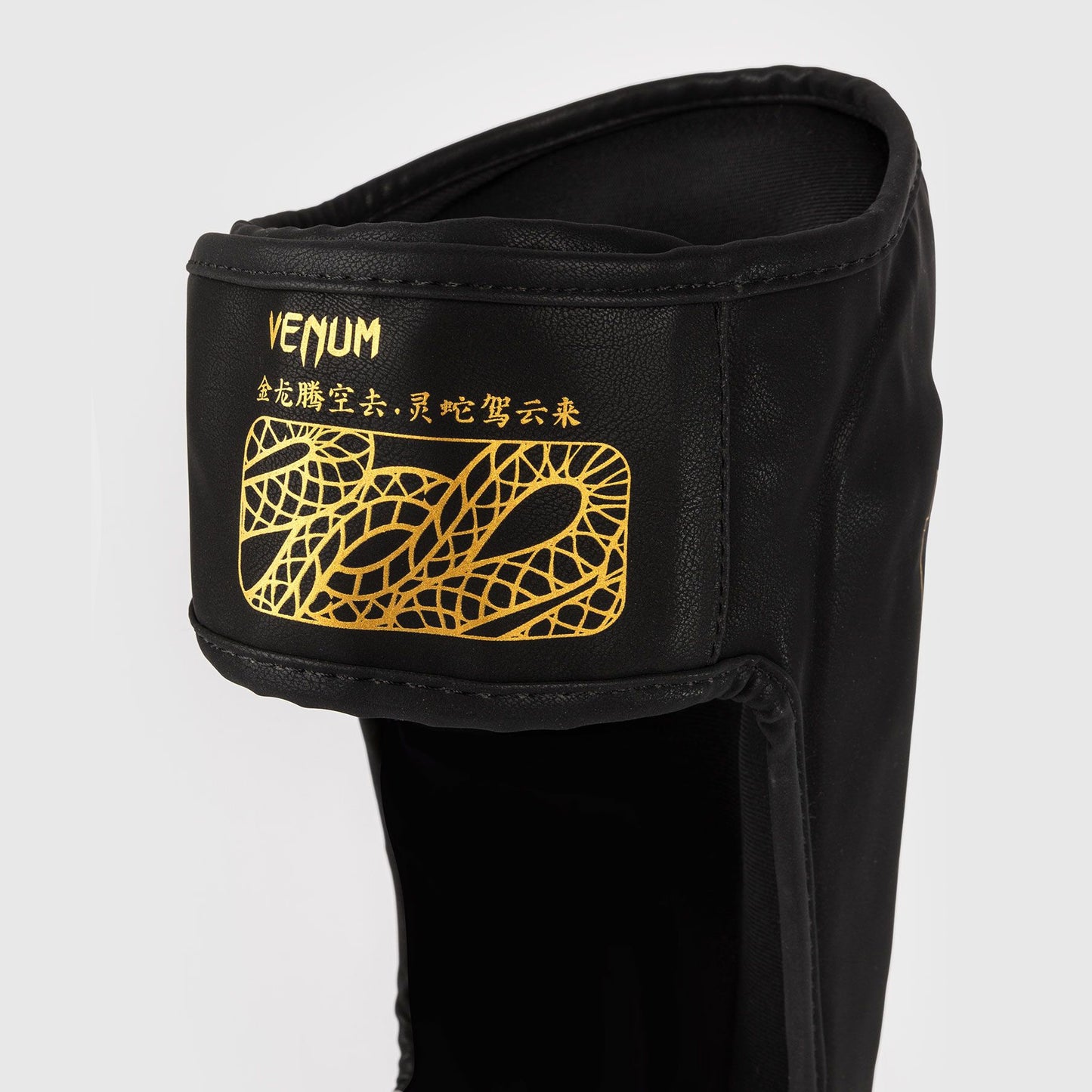 Venum Serpenti Shin Guards Black/Silver/Gold - The Fight Club