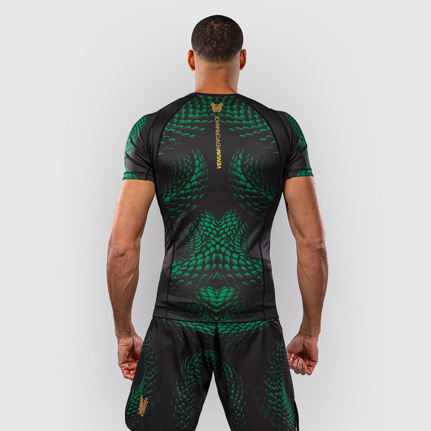 Venum Matupa Short Sleeve Rash Guard Black/Green/Gold - The Fight Club
